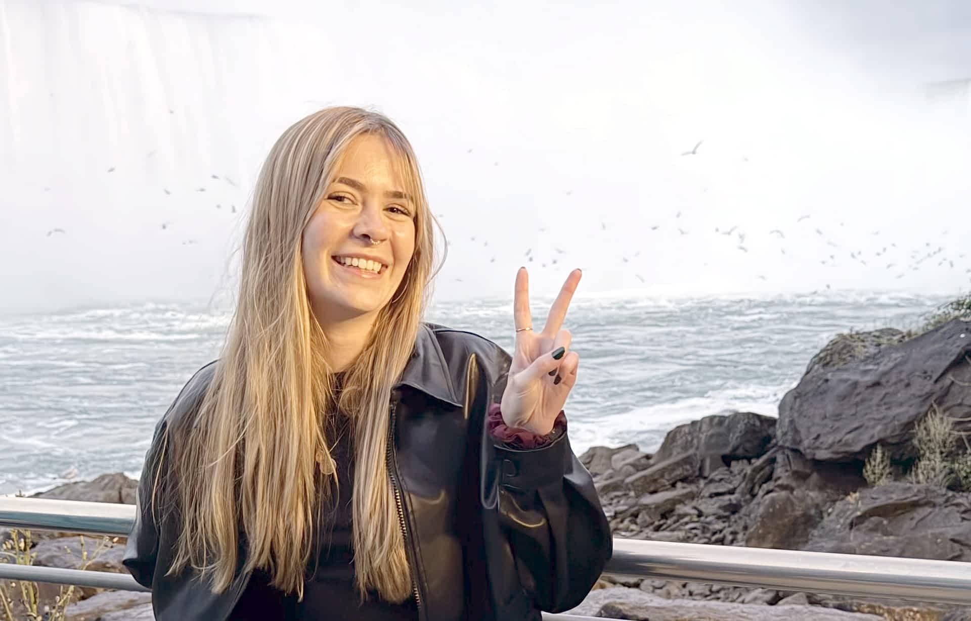 Girl taking a photo at the Niagara Parks Power Station Tunnel